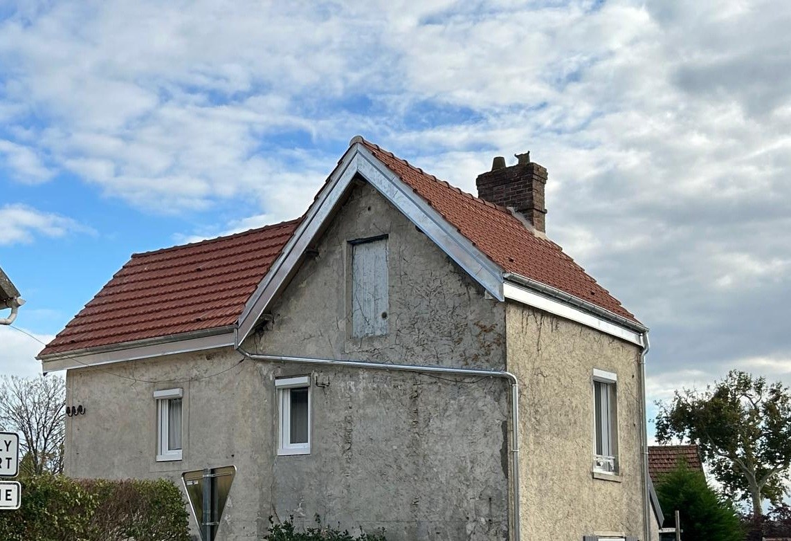 Après chantier : toiture terminée en tuiles mécaniques